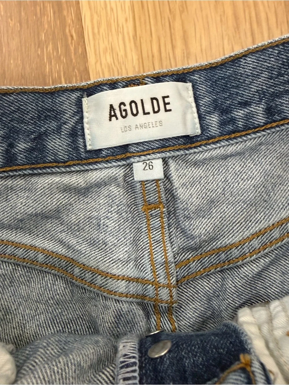 AGOLDE High-Rise Frayed Hem Denim Shorts in Medium Blue size 26